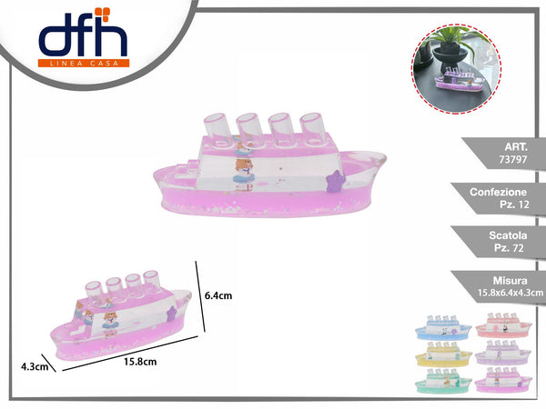 Soprammobile portapenne a forma di nave con liquido colorato
